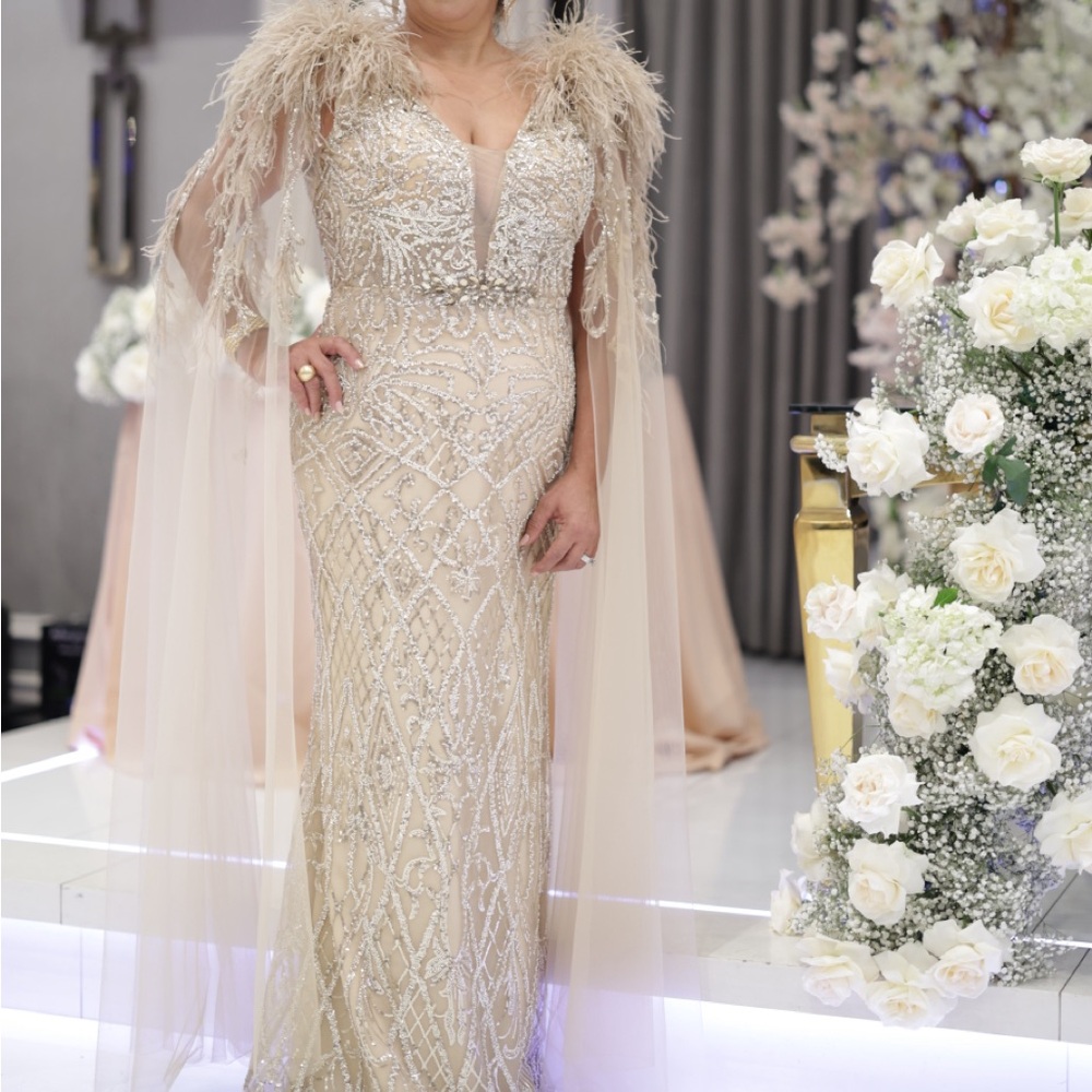 Elegant Cream Feathered Wedding Dress